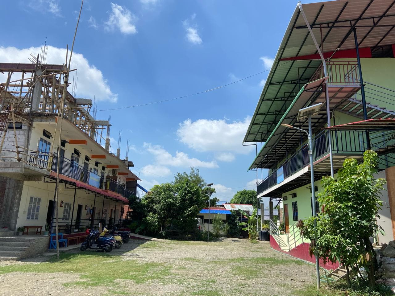 Mangal Educational Institute campus courtyard and academic wings